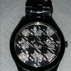 Michel Kors Black and Silver interior watch.
